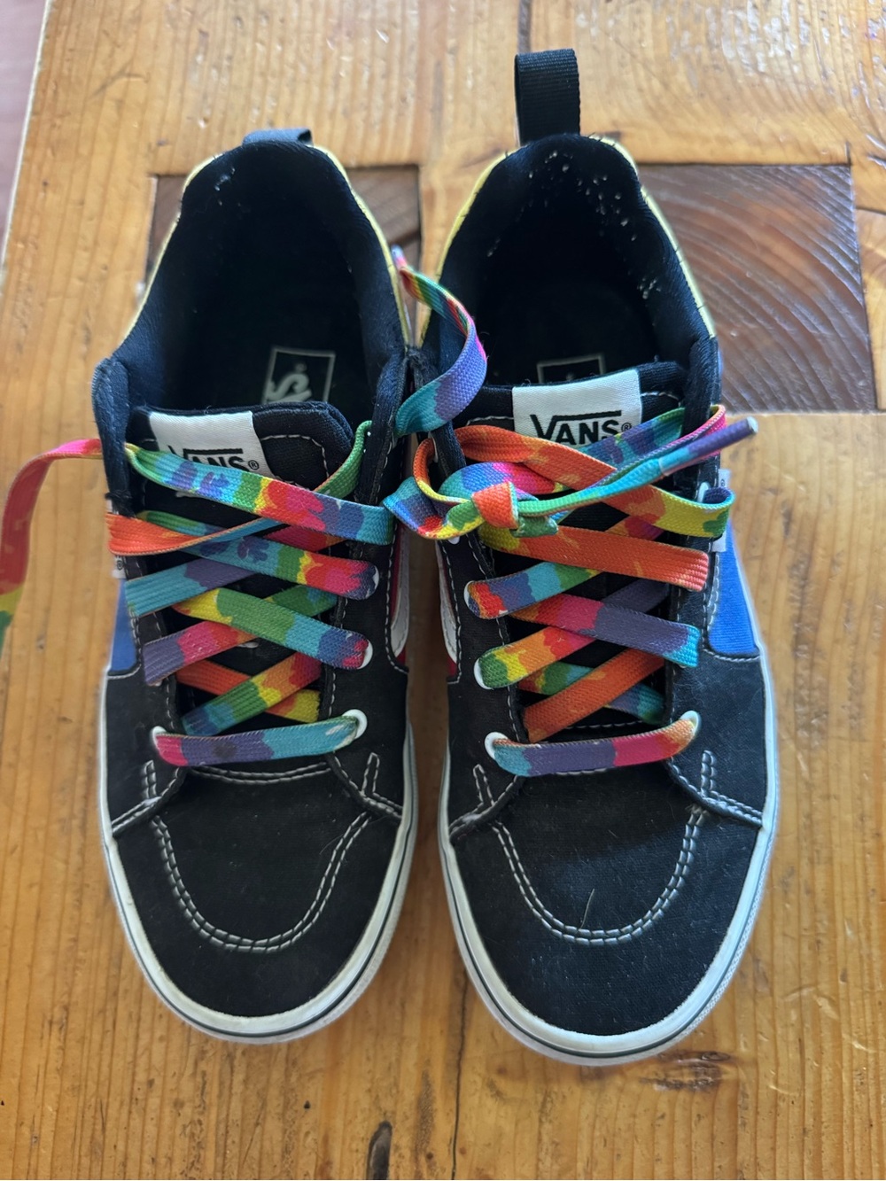 Vans Big Kids Black, Red, Blue, and Yellow Canvas Sneakers with Rainbow Laces